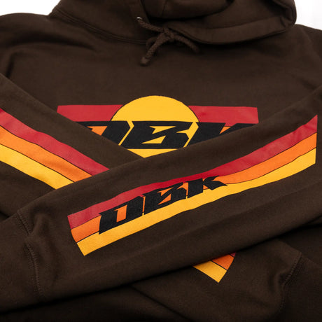 Sleeve graphic on dark brown hoodie with red, orange, and yellow striped design