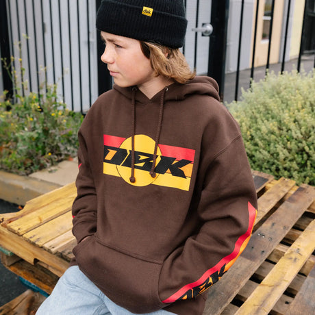 Brown youth hoodie with large chest DKB logo, drawstring hood, and side sleeve stripe