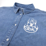 Burnout oversized denim shirt close-up: pointed collar and flame dbk chest logo