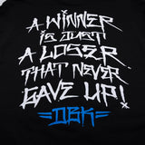Black T-shirt close-up with white and blue graffiti-style front print