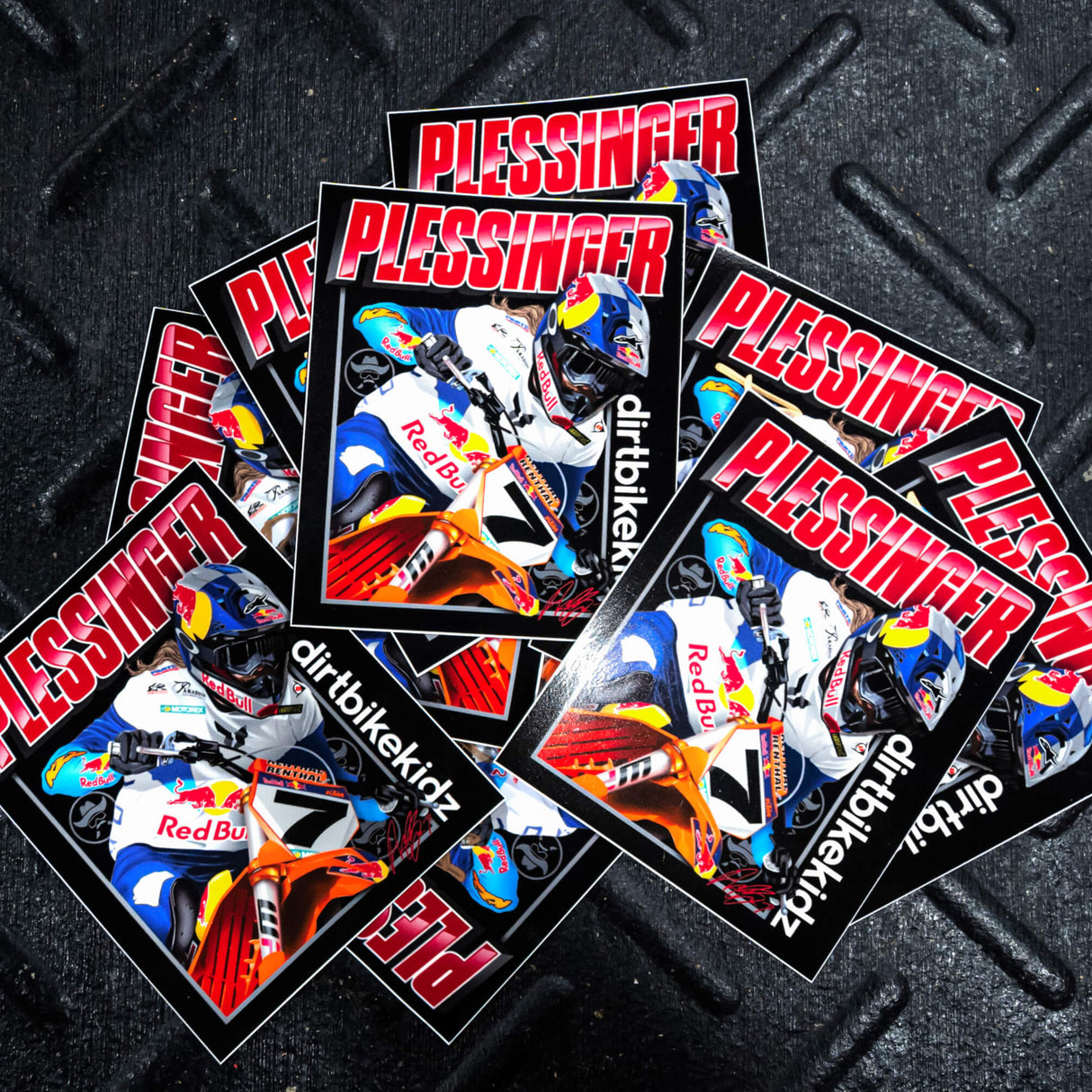 Motorcycle sticker pack with multiple square stickers featuring rider art and PLESSINGFER text