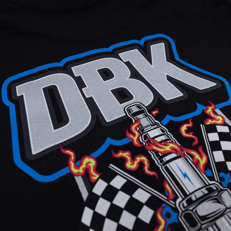 Black crewneck tee close-up of large DBK logo with blue outline and flames