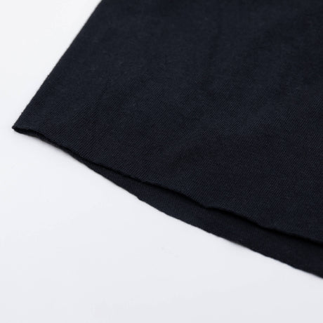 Women's black T-shirt side hem detail in smooth knit fabric