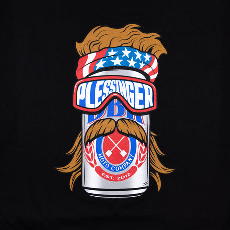 Black youth premium tee close-up: “PLESSINGER” goggles and moto badge graphic
