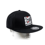 Black snapback hat with Dirt Bike Kidz front logo and curved brim