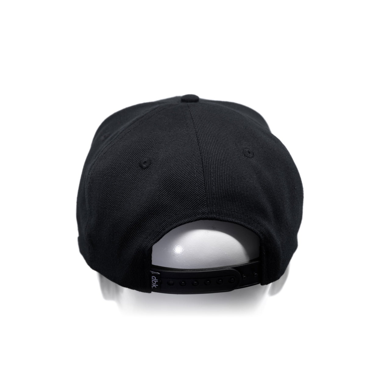 Black snapback cap with curved brim, stitched panels, and adjustable back strap