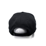 Black snapback cap from back view with curved brim and adjustable strap