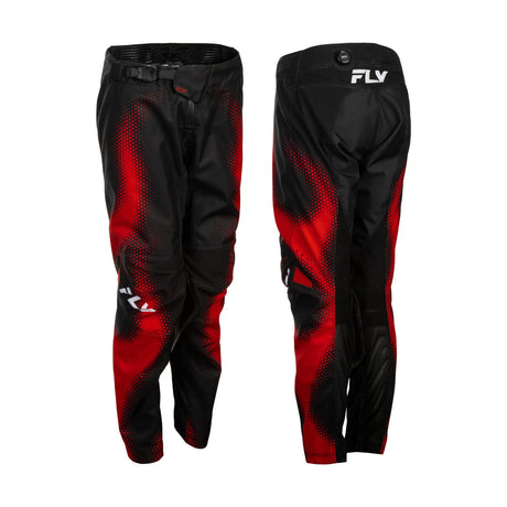 Youth motocross pants in black with red graphic panels and patterned detailing
