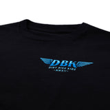 Close-up of black T-shirt chest graphic with blue DBK logo and tagline.