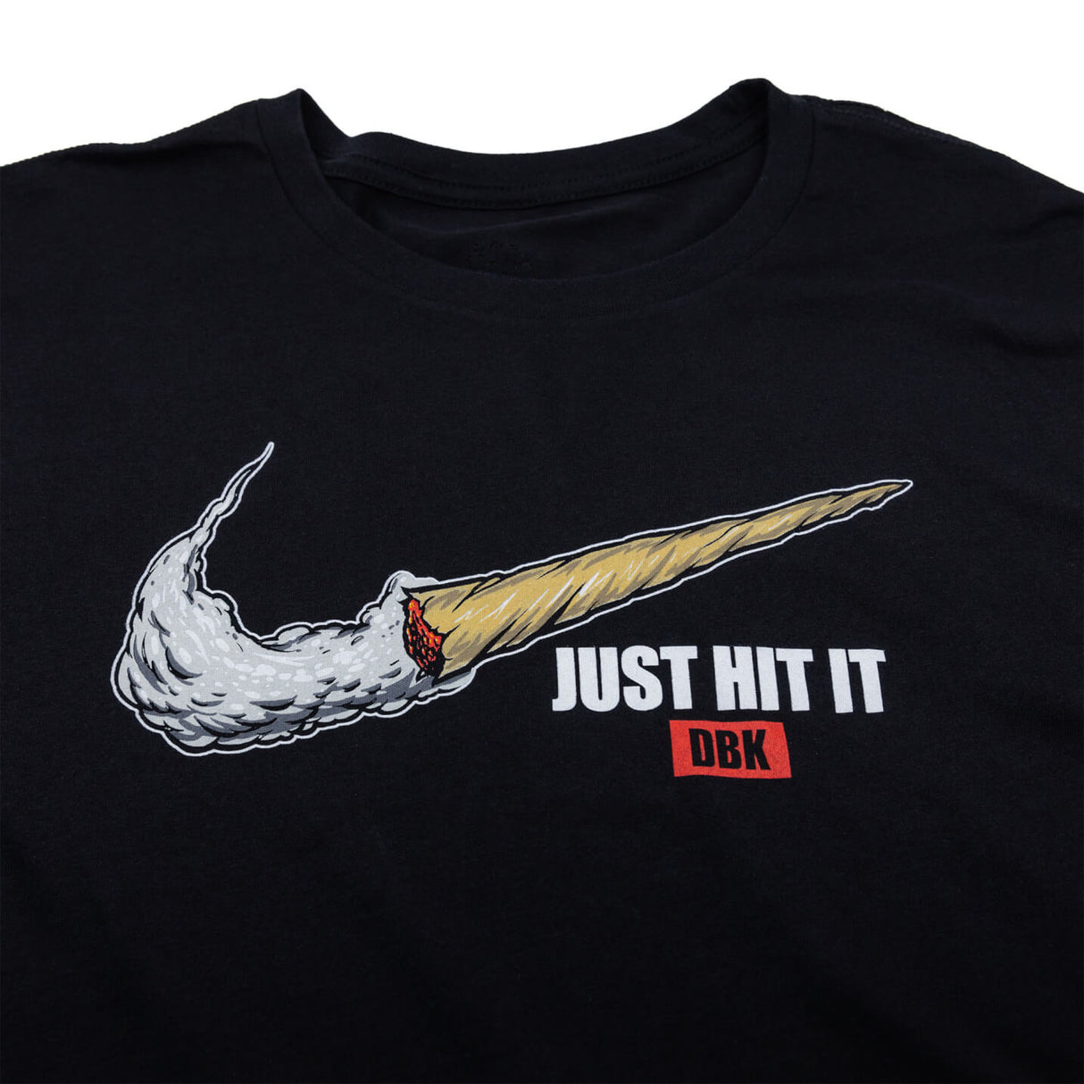 Black T-shirt close-up of 'JUST HIT IT DBK' front graphic