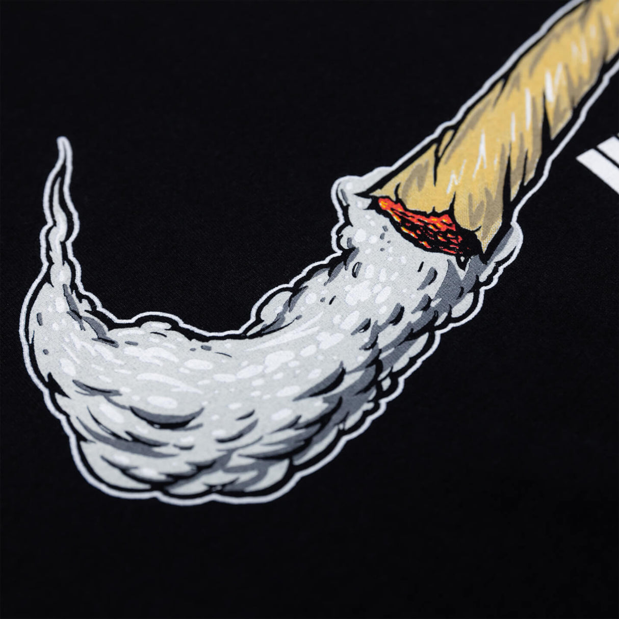 Black T-shirt close-up of flame and yellow spear graphic