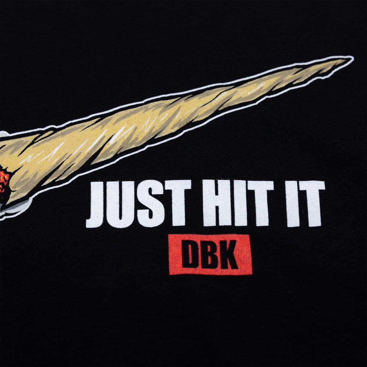 Black T-shirt close-up of 'JUST HIT IT' text and red 'DBK' label