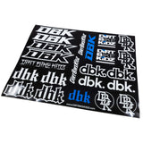 Sticker sheet angled showing white graphic lettering and blue accents on black