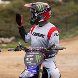 Kinetic DBK jersey in white with red side panels and black DBK print on chest