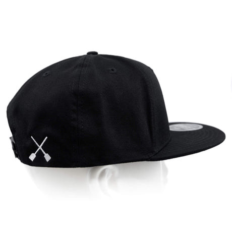 Black snapback hat with white X logo on the back panel.