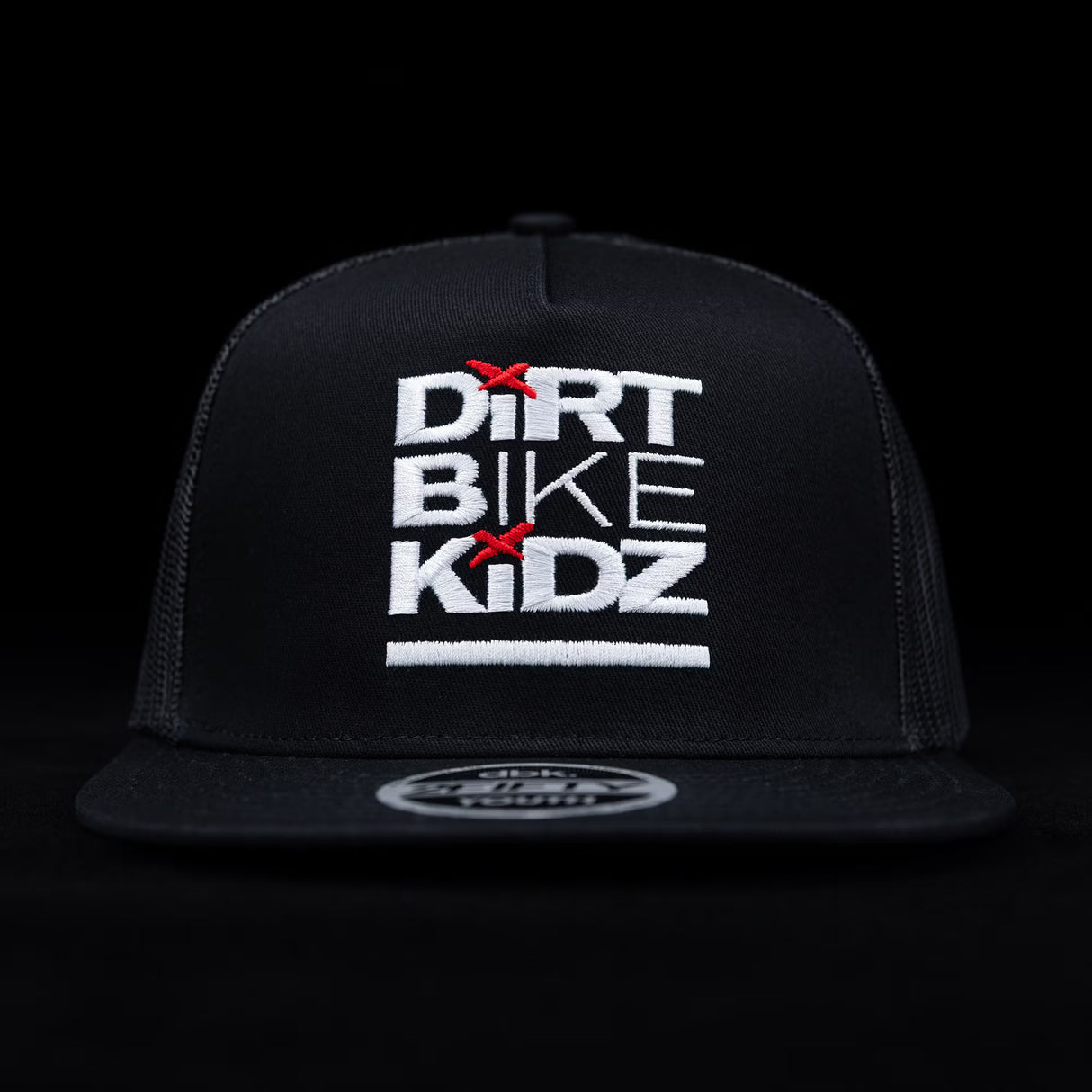 Youth black baseball cap with 'Dirt Bike Kidz' front logo and red star accents