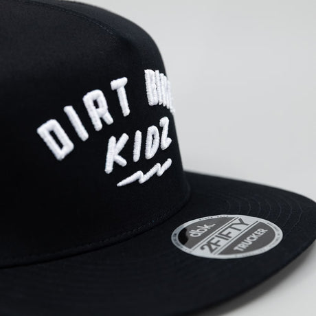 Black cap showing “Dirt Bike Kidz” embroidery and front “2Fifty Trucker” patch