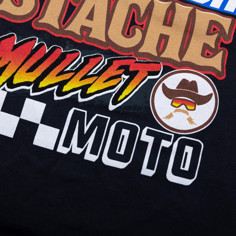 Black womens graphic T-shirt close-up of Mullet Moto and checkered text