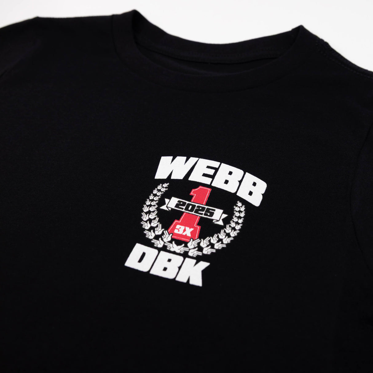 Black youth tee closeup with WEBB 2025 DBK graphic at center