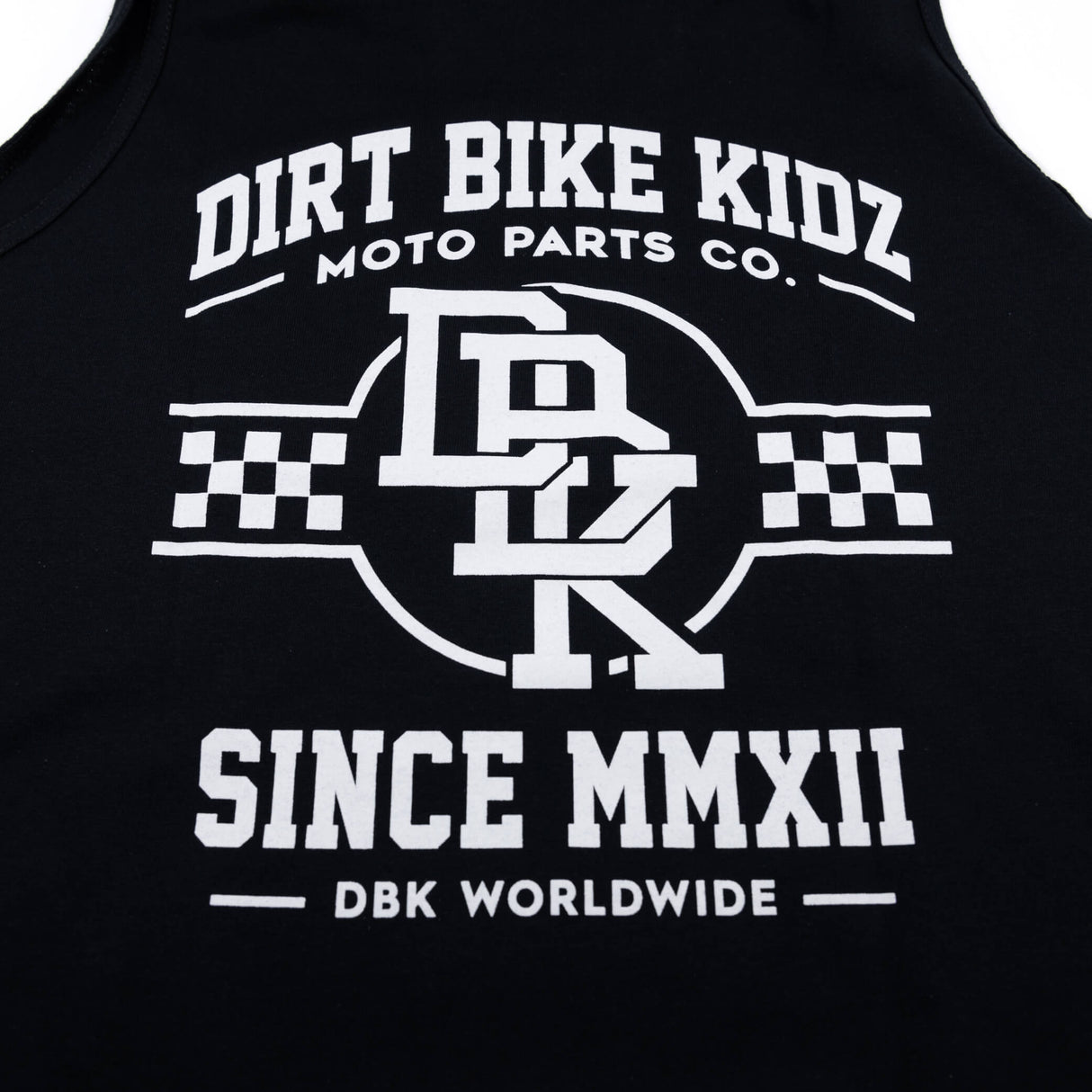 Black youth tank top close-up of 'DIRT BIKE KIDZ' and 'SINCE MMXII' racing print.
