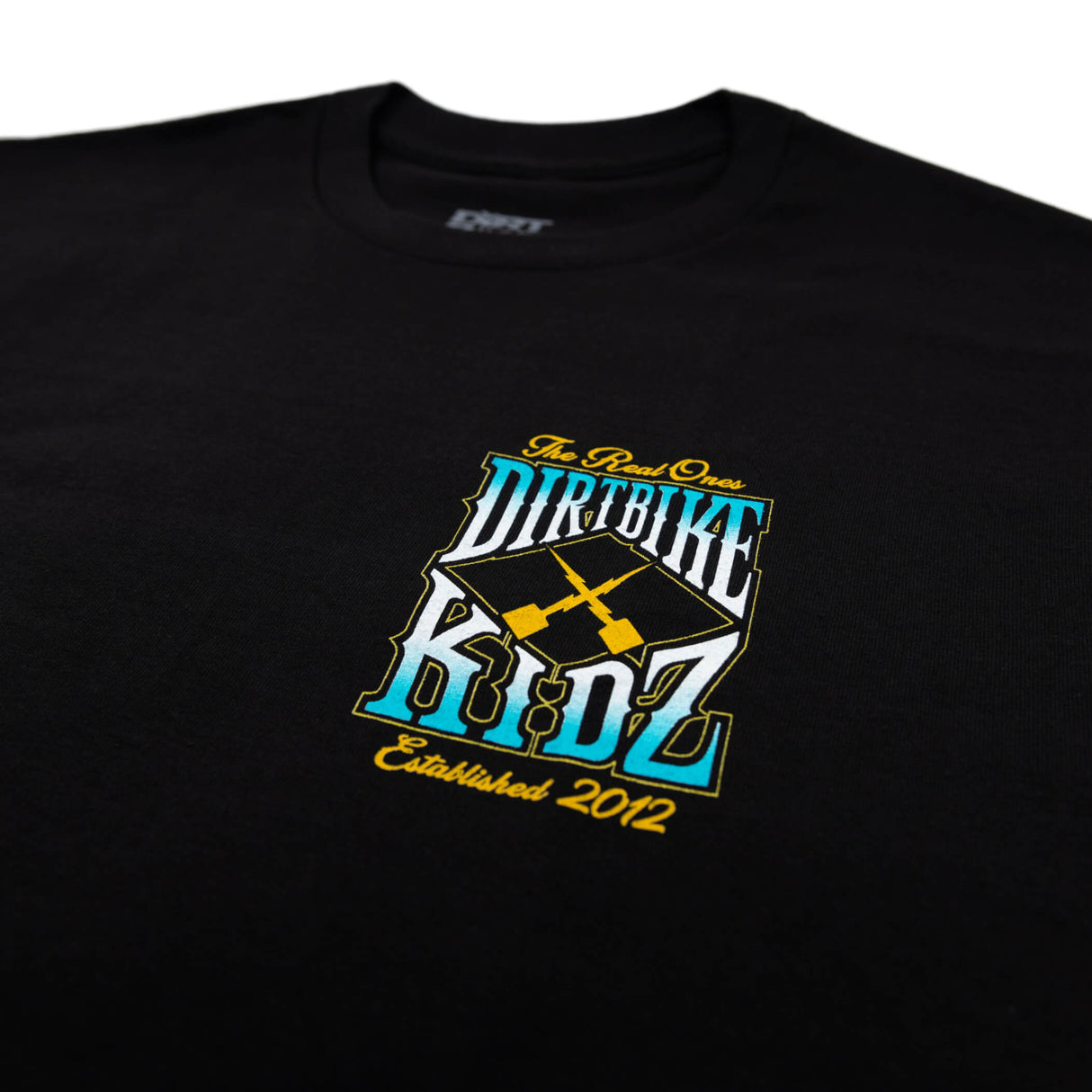 Black tee close-up with 'Dirtbike Kidz' established 2012 logo