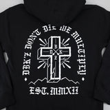 Black zip hoodie with front cross emblem and circular white lettering on chest.