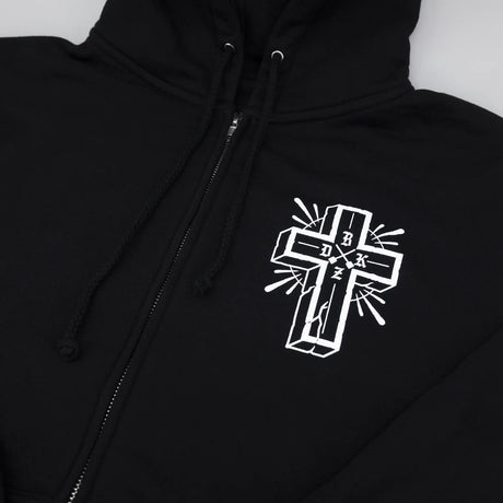 Black hoodie front close-up with white cross logo on the chest.