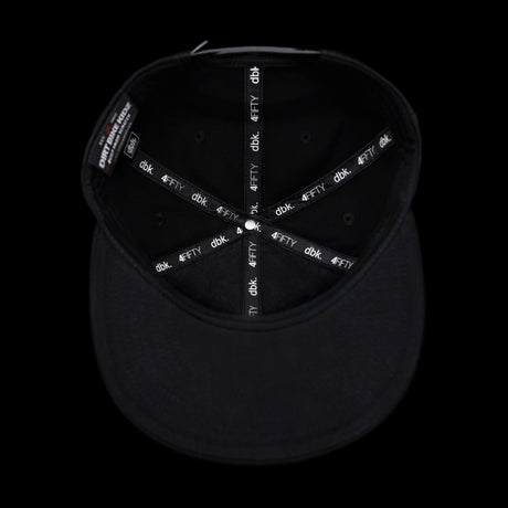 Black snapback hat interior showing stitched lining with dbk 4FIFTY repeat labels