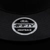 Black snapback cap underside with dbk 4FIFTY snapback circular patch