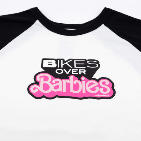 Raglan T-shirt close-up of Bikes Over Barbies logo on white chest