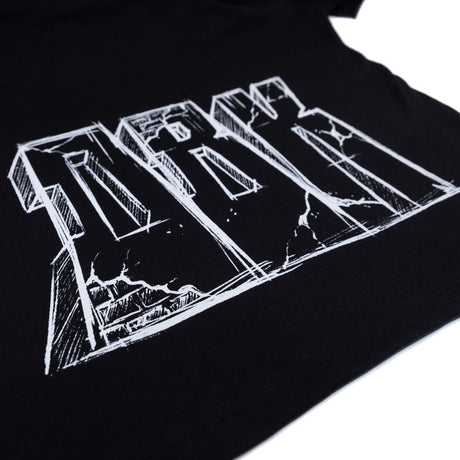 Black T-shirt close-up of large white graphic lettering print
