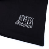 Black T-shirt close-up of white logo text and graphic lettering