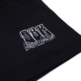 Black T-shirt close-up of small white logo print