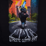 Black T-shirt back view with rider over road graphic and bold white text