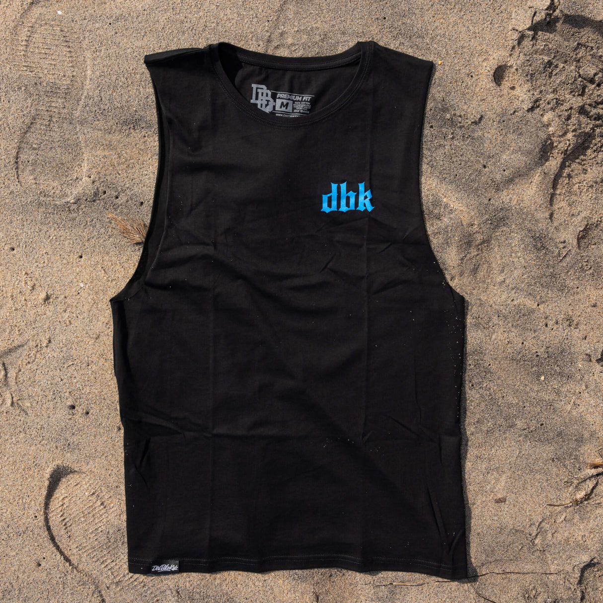Black sleeveless tank top with blue dbk logo on chest, crew neck