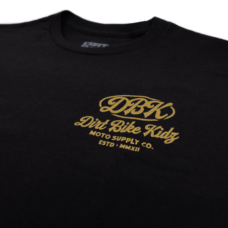 Youth Premium Tee, schwarz, Detail des Gold DBK Dirt Bike Kidz Prints