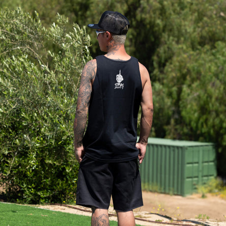 Black tank top with small white logo print on the upper back