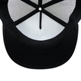 Black trucker hat underside with curved brim and mesh back openings