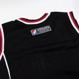 Black jersey tank collar with woven label and white-red striped neckline trim.