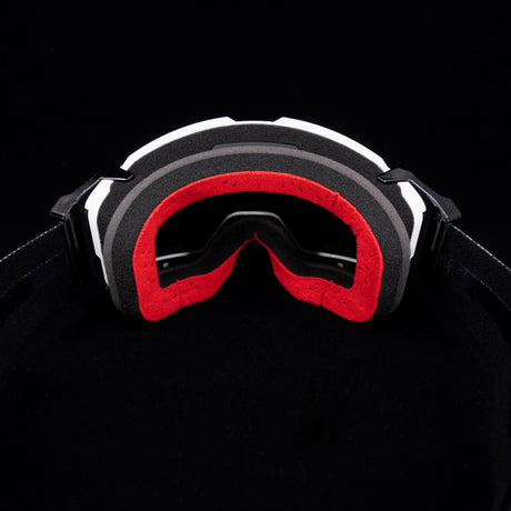 Helios goggle with red inner foam and black frame, front view