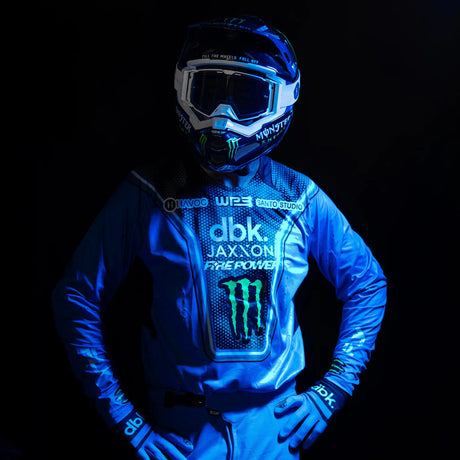 Blue motocross gloves with dark wrist cuff and printed graphics on the palm and back