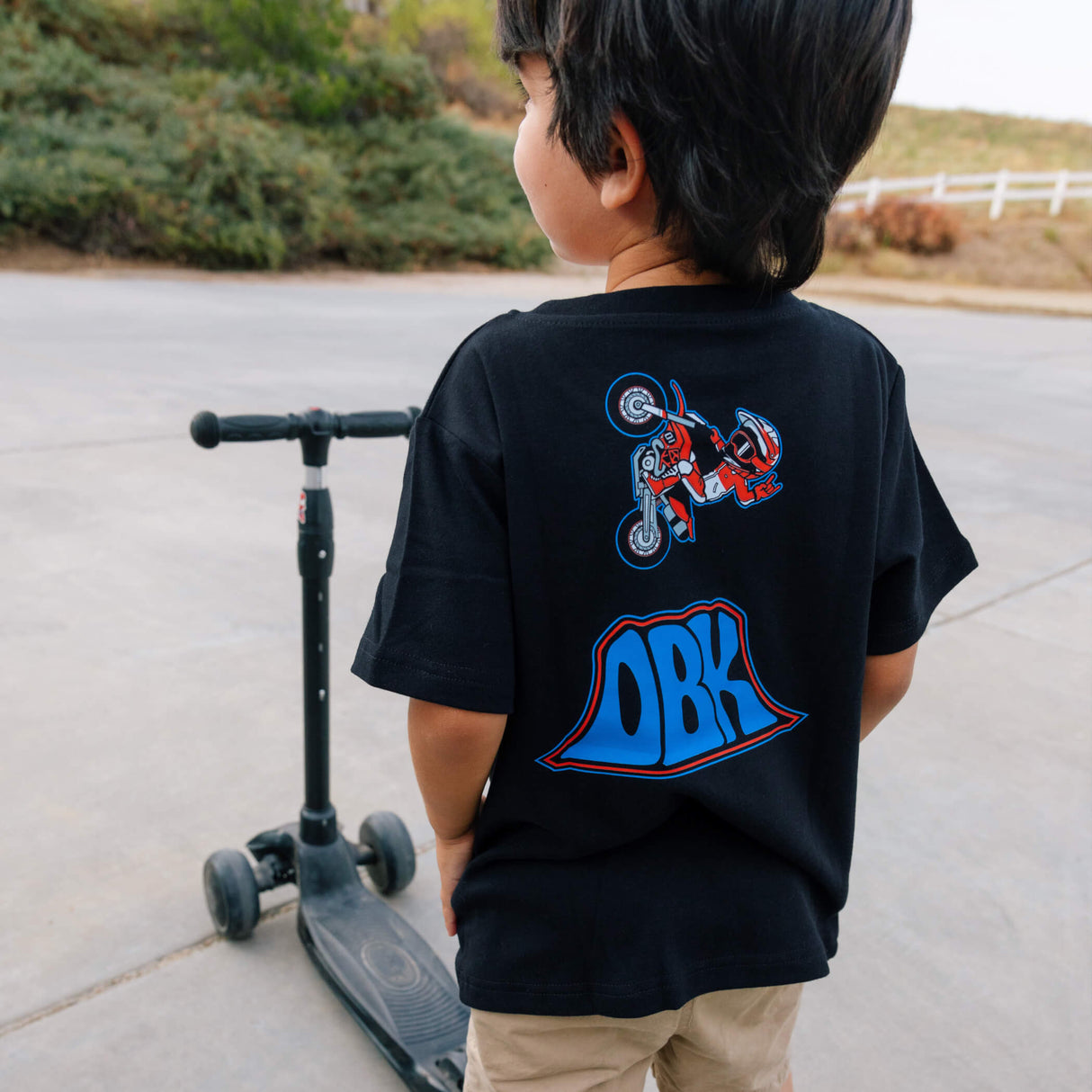 Toddler black T-shirt with back motorcycle rider and ORK ramp graphic