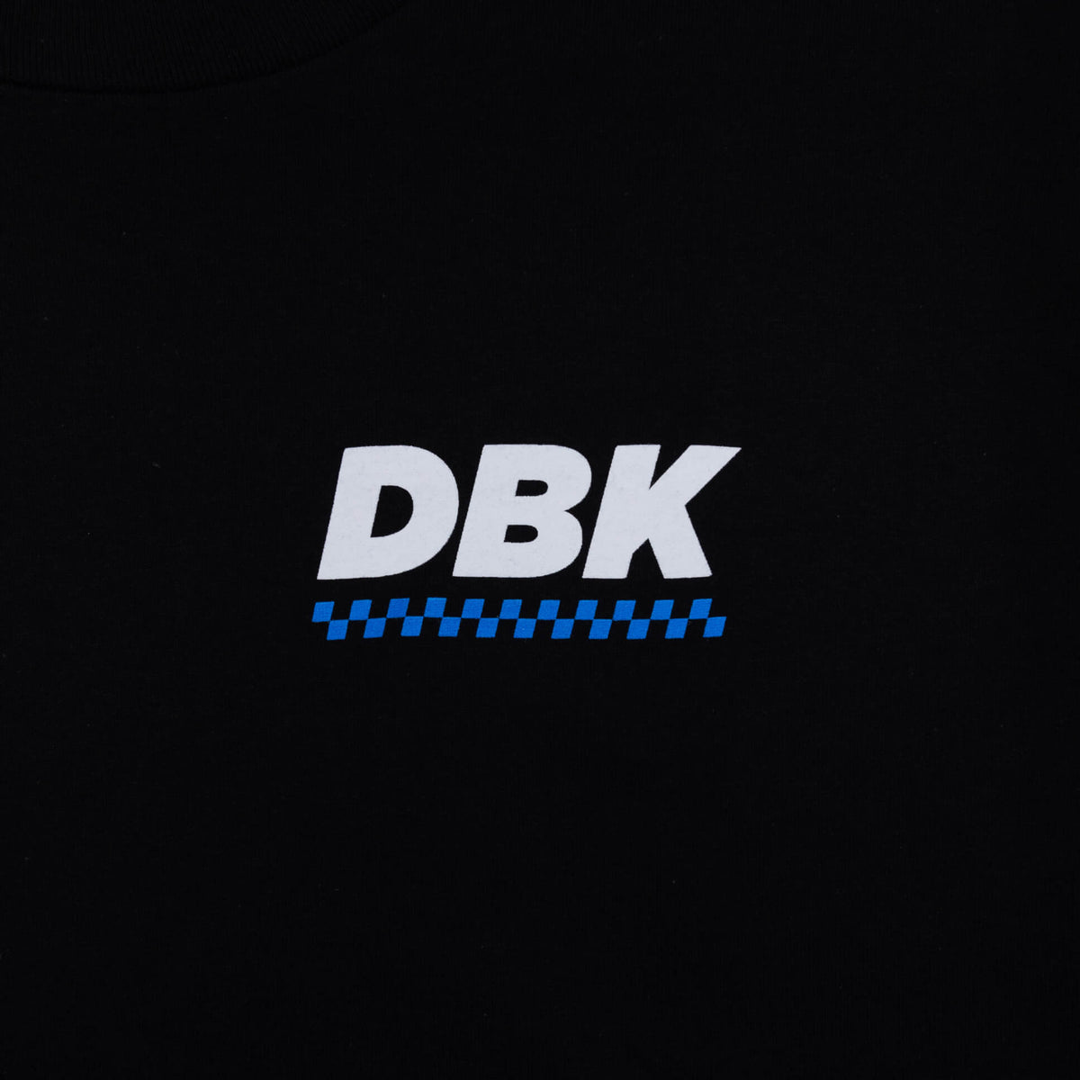 Youth premium tee, black knit, DBK logo graphic on the chest with blue checker stripe
