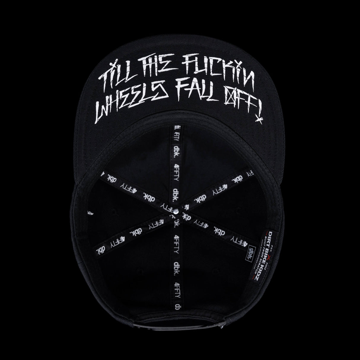Black snapback cap interior with circular white graphic and text