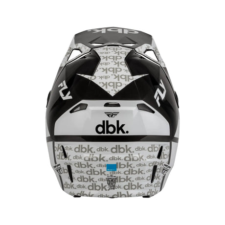 Black and white full-face helmet with dbk patterned branding and front logo