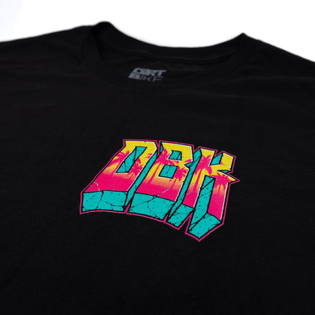 Close-up of DBK block logo print on black T-shirt, multicolor