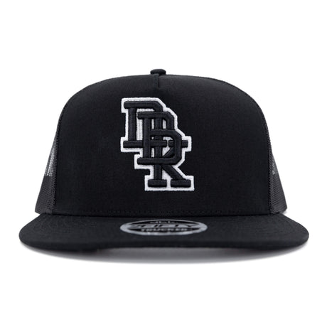 Black trucker cap front view with white DBK 2Fifty logo patch
