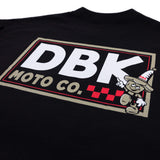 DBK Moto Co. rectangular logo graphic printed on a black T-shirt back.