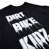 Youth premium tee close-up: black shirt with white distressed "DIRT BIKE" graphic