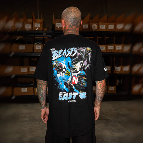 Black T-shirt worn by model with large back “Beasts” “EAST” graphic